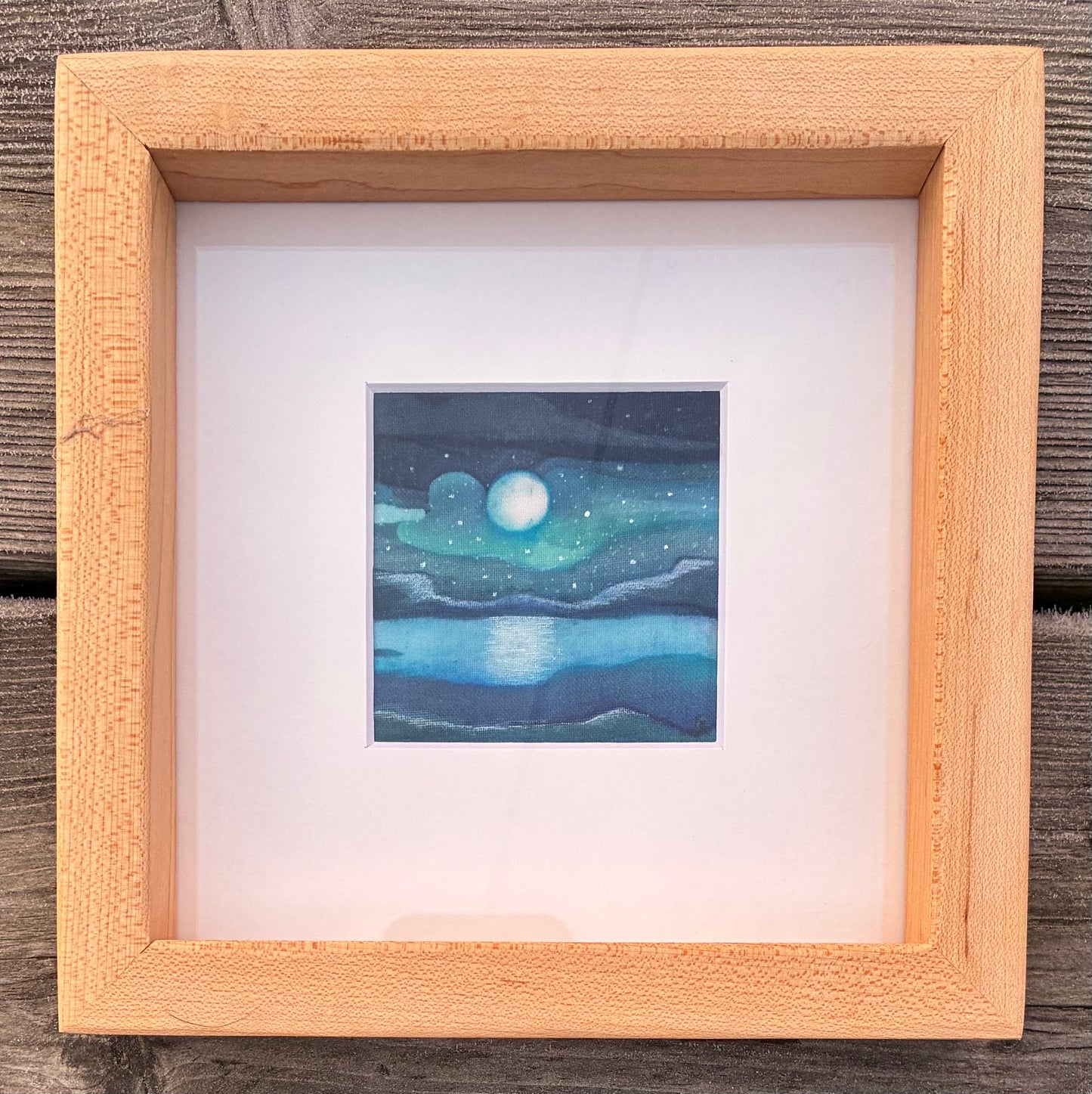 Batik, in a reclaimed wood, frame.